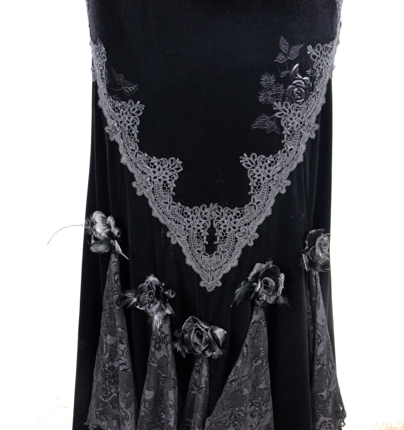 Elegant black velvet skirt with intricate lace and rose details, perfect for vintage goth fashion.