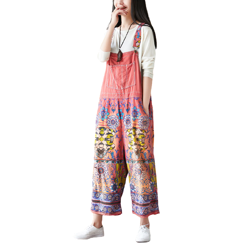 Vintage women's wide-leg jumpsuit with colorful floral prints, perfect for a trendy and stylish look.