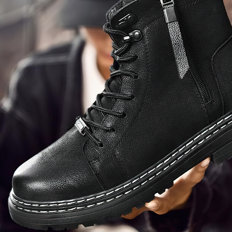 Men's stylish black leather ankle boots with laces and flexible wear-resistant sole, ideal for casual outings.
