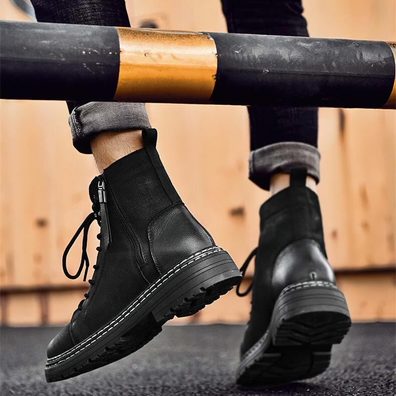 Stylish men's black ankle boots with flexible soles and laces for a comfortable fit, perfect casual footwear.