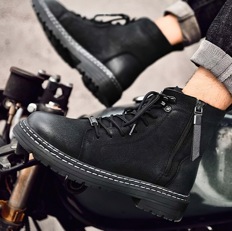 Stylish men's black ankle boots with lace-up design and durable sole, perfect for casual wear and comfort.