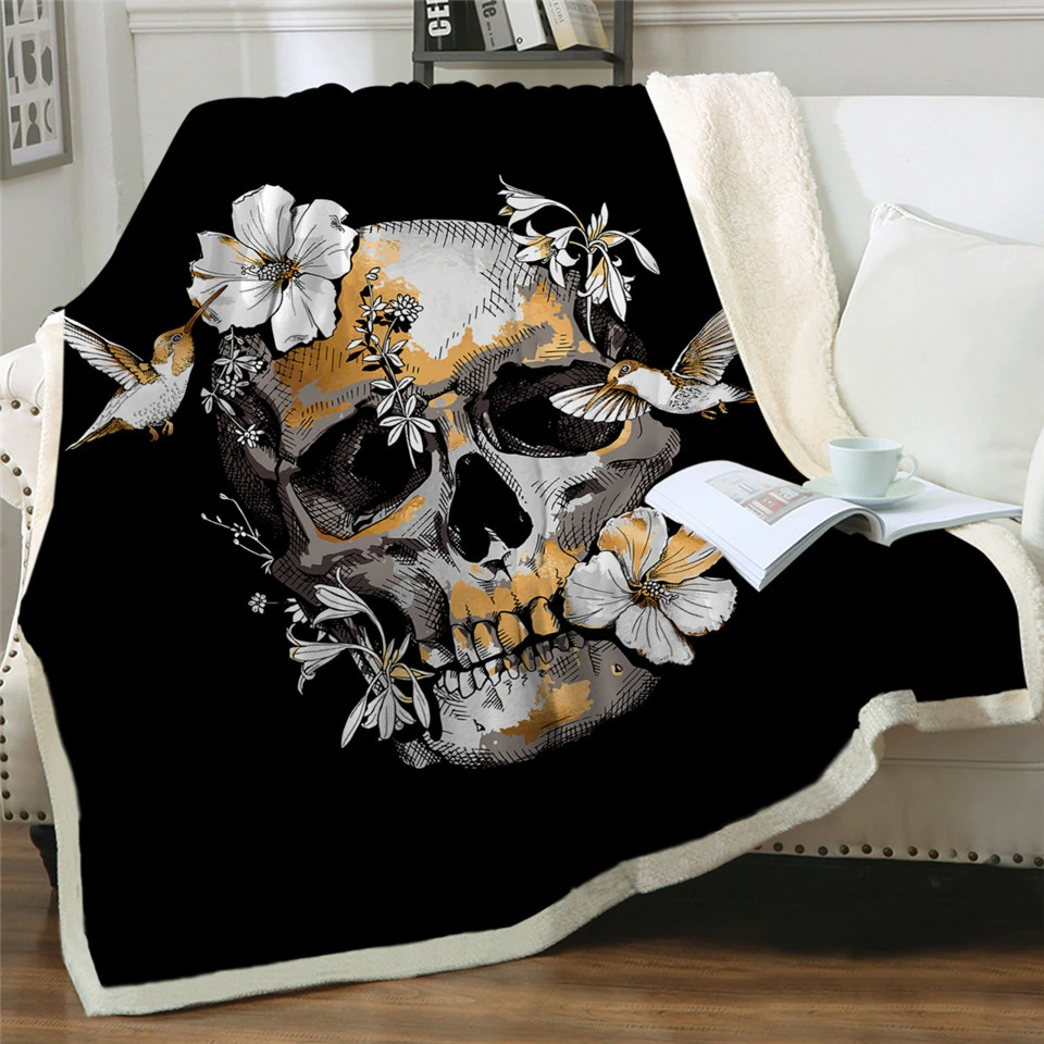 Warm black blanket with 3D skull print and floral designs, perfect for gothic decor and cozy evenings.