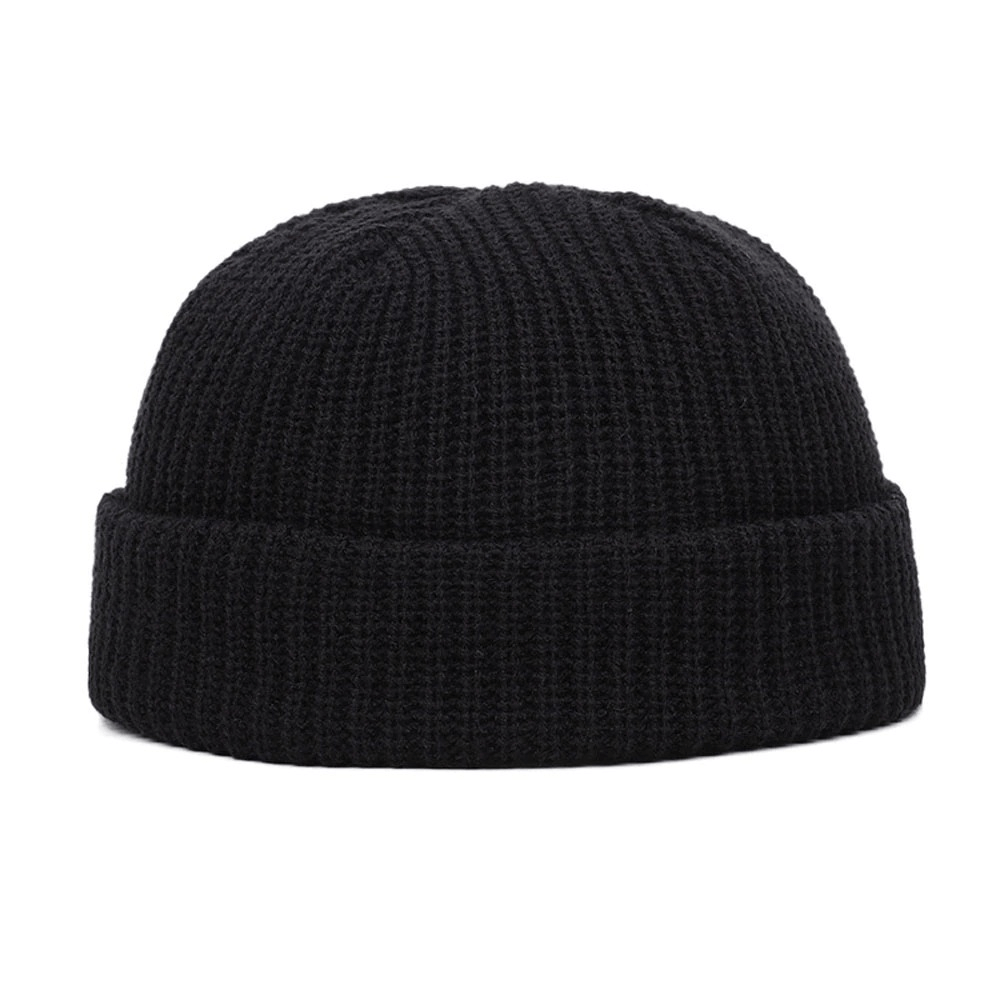 Black knitted wool skull beanie for men, perfect for casual style and warmth during chilly days.