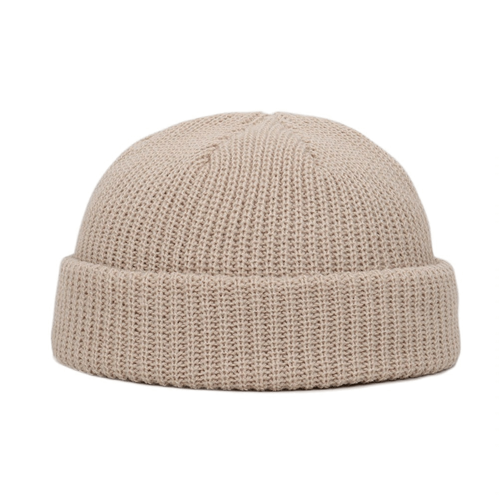 Warm beige wool knitted skull cap for men, perfect casual accessory for winter style.