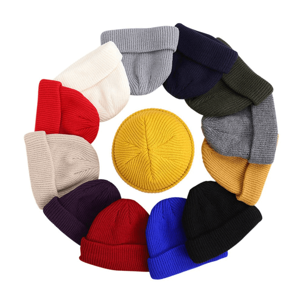 Colorful collection of warm casual beanies arranged in a circle, showcasing various styles and hues for men.