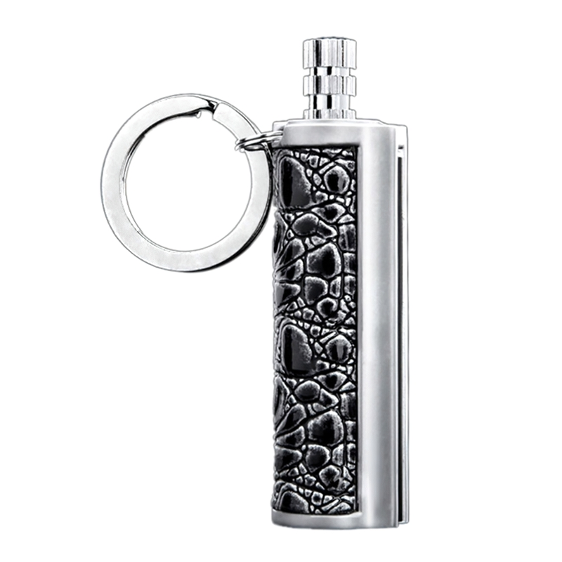 Vintage waterproof kerosene lighter with keychain, stylish design in black and silver.