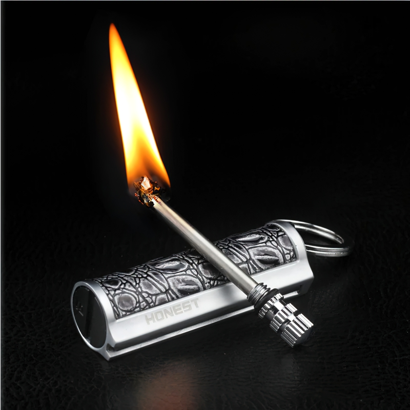 Waterproof vintage kerosene lighter with stylish design, flame ignited, perfect for keychains, available in two colors.