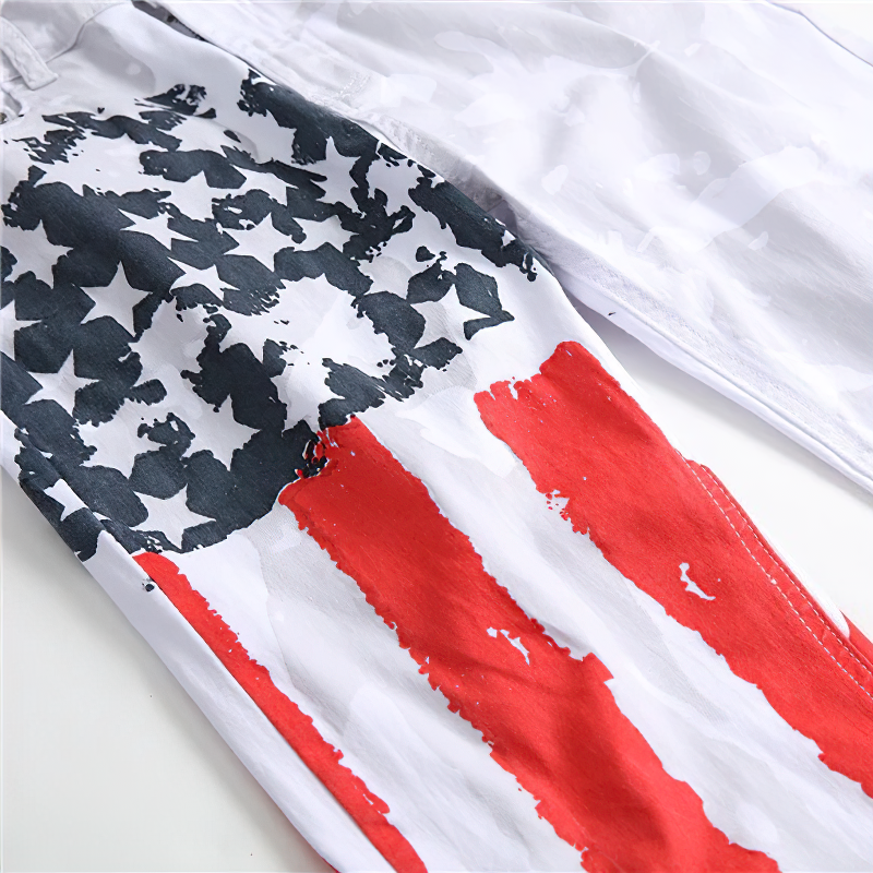 Close-up of white jeans featuring USA flag print, perfect for rock style enthusiasts looking for a fresh, stylish look.