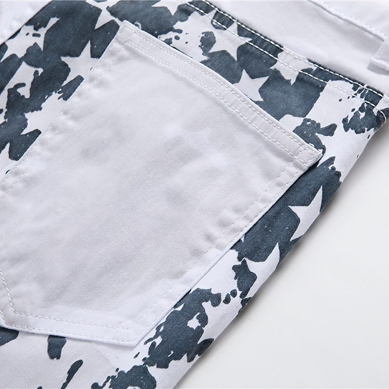 Close-up of white jeans with USA flag print showing pocket detail, ideal for rockstyle enthusiasts.