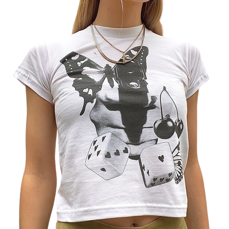 White crop top featuring butterfly print, dice, and cherries on a stylish female model.