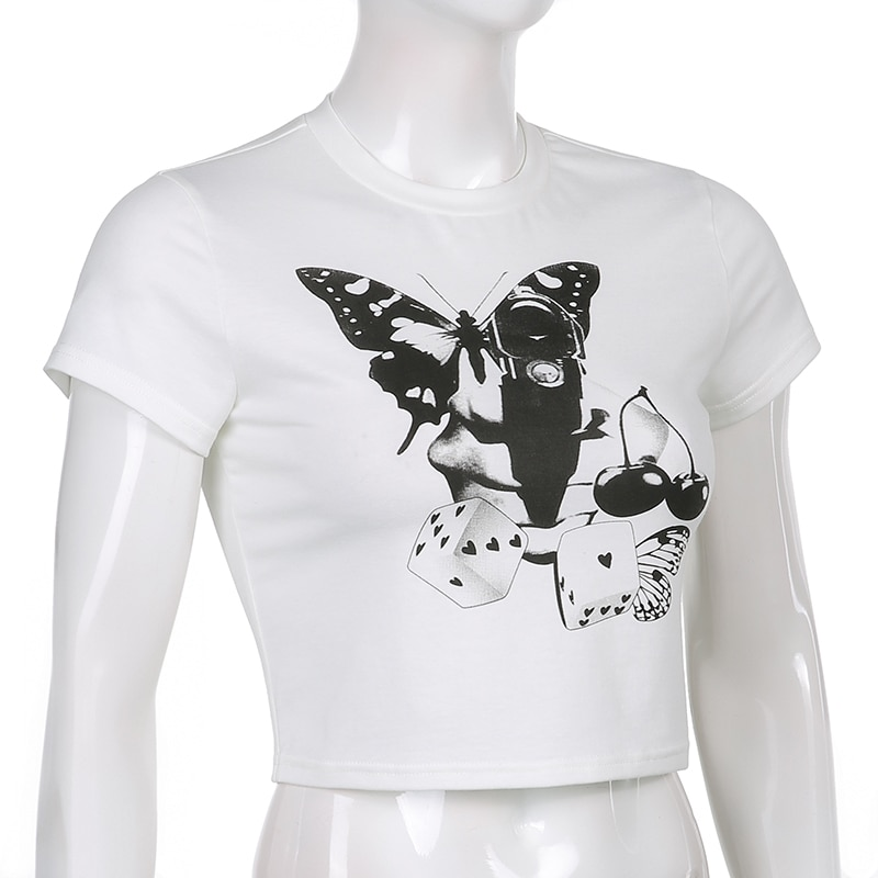 Stylish white crop top with butterfly and dice print, perfect for alternative fashion lovers.