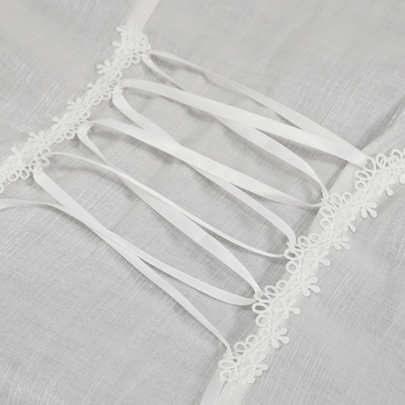 Close-up of white lace shirt detailing with elegant ribbon lacing and floral accents in gothic style.