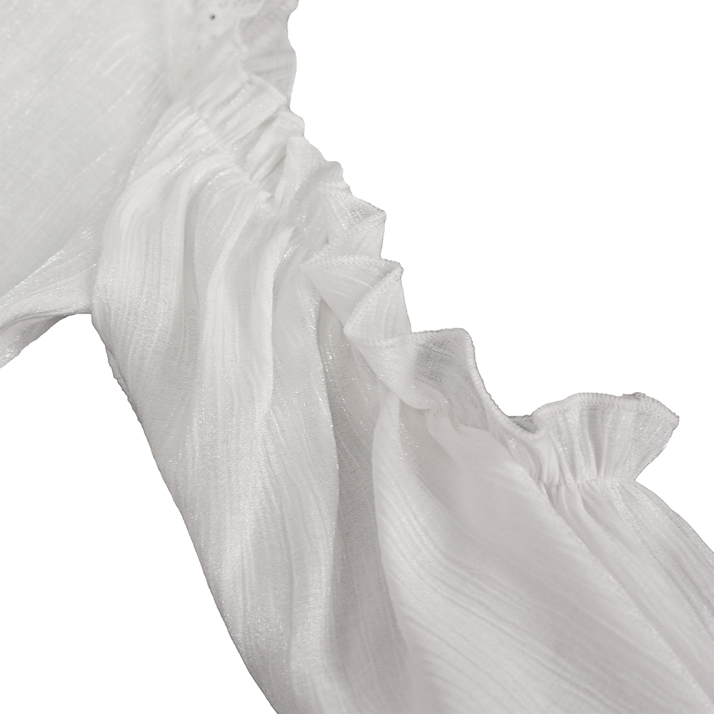 Detail of white lace fabric with ruffled off-shoulder design for a gothic women's blouse.