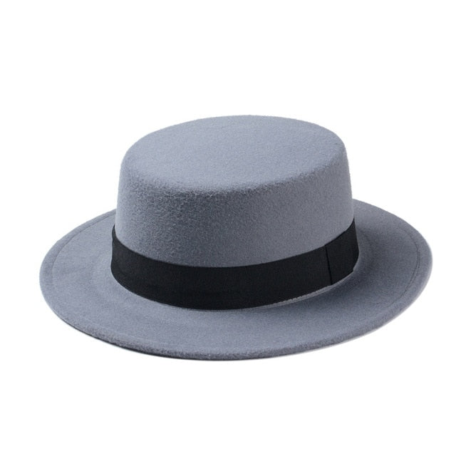 Wide brim gray Gambler hat with a flat top and black band, perfect for women’s alternative fashion.