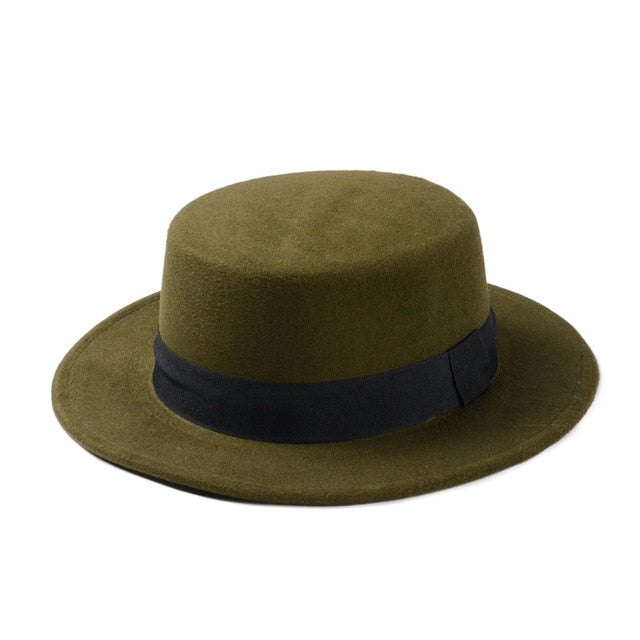 Wide brim flat-top fedora hat in olive green with a black ribbon band, perfect for women's alternative fashion.