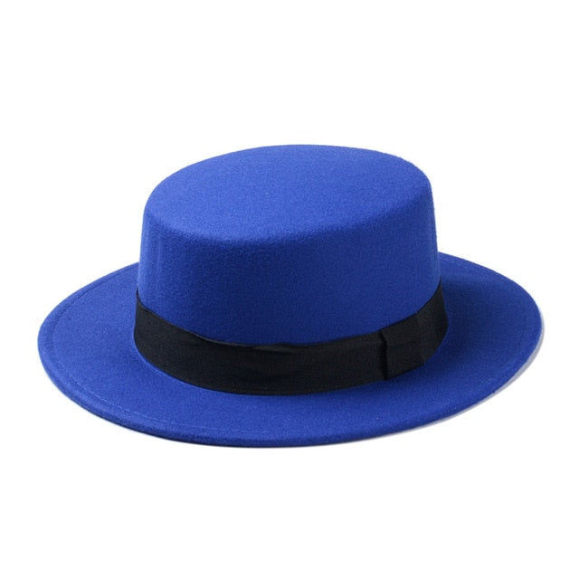 Blue flat-top fedora hat with a wide brim and black band, perfect for women's alternative fashion.