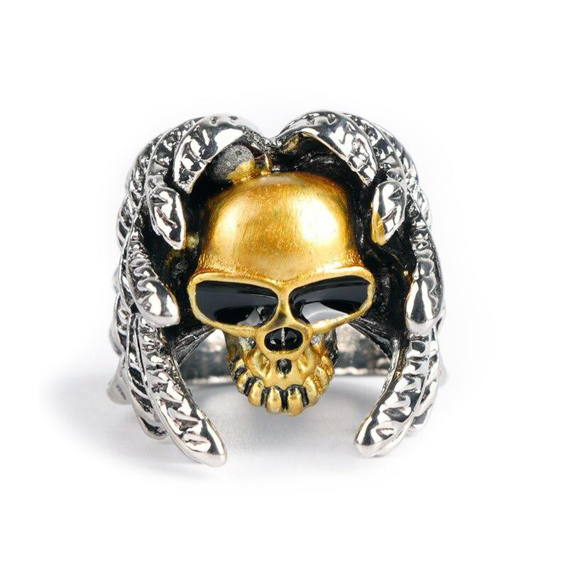 Winged skull ring in silver and gold, featuring sunglasses, perfect for gothic and steampunk jewelry lovers.