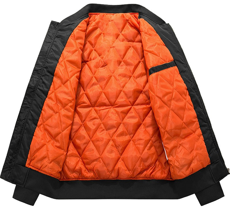 Inside view of a cotton padded pilot MA-1 bomber jacket featuring a stylish orange lining.