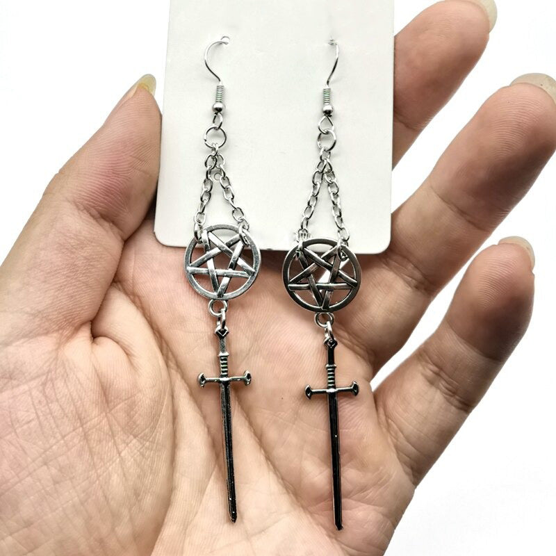 Witch's Rites earrings with pentagram and sacred black sword pendants, perfect for gothic rock style.