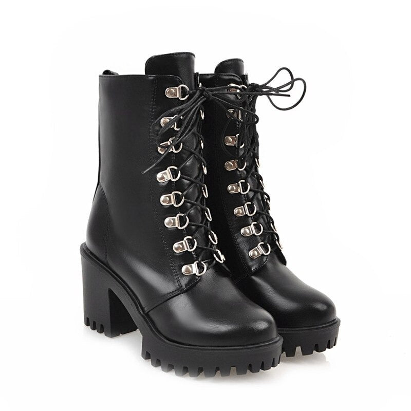 Stylish woman's black fashion boots with square heel and quality lacing in gothic style.