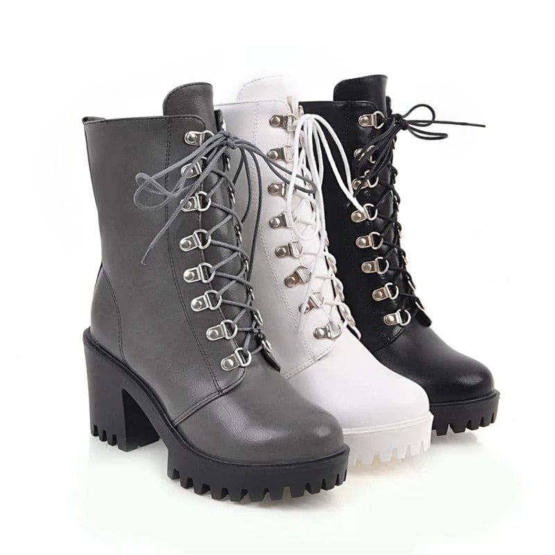 Fashionable women's gothic boots with square heels, available in gray, white, and black styles.