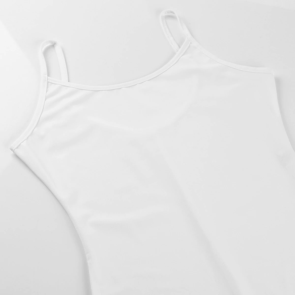 White spaghetti-strapped women's stretchy jumpsuit, perfect for layering or workouts in comfort and style.