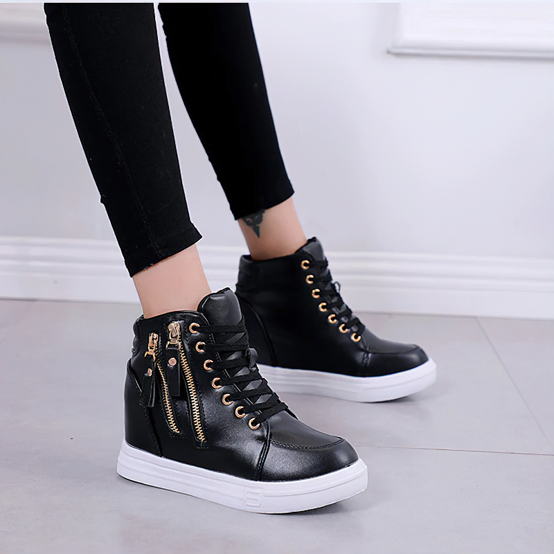 Stylish black women's ankle boots with gold zippers and laces, perfect for casual outings and height elevation.