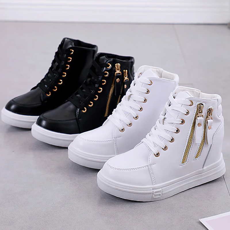 Stylish women ankle boots in black and white with zippers and decorative laces for casual wear.