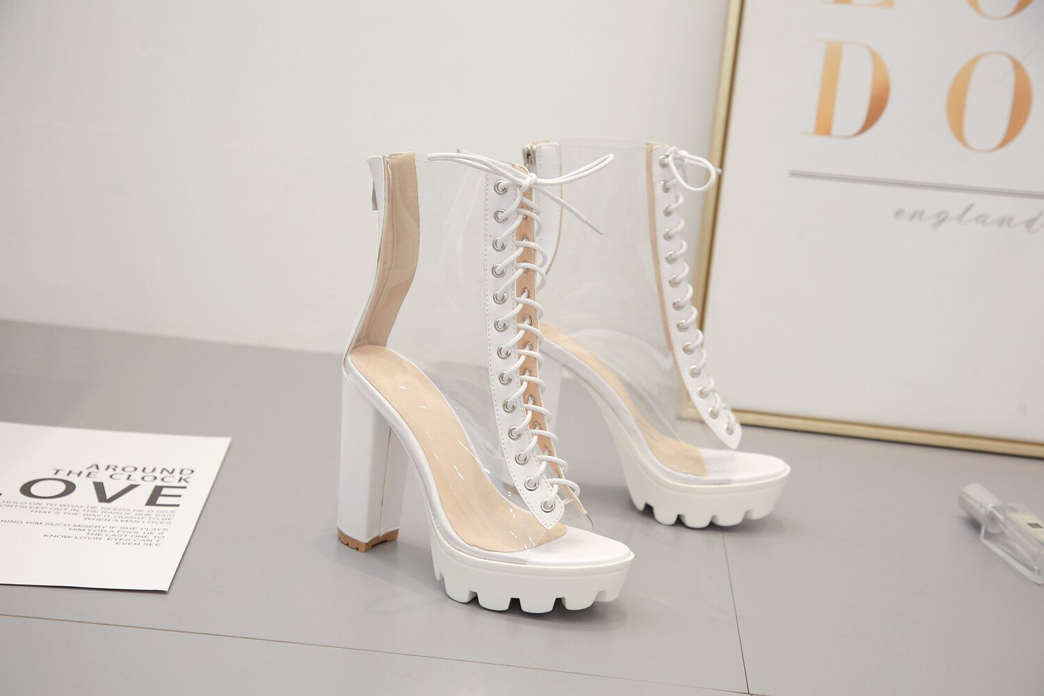 Stylish women ankle pump shoes with transparent design and high heels, perfect for trendy outfits.