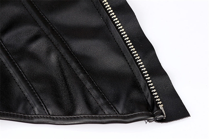 Close-up of a women's black faux leather bustier with stylish zipper detail, showcasing gothic design elements.