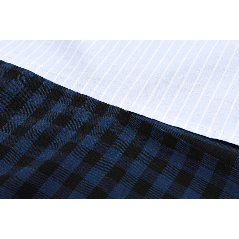 Close-up of blue and white striped plaid fabric, showcasing unique patterns for grunge style shirts.