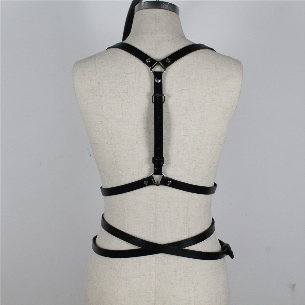Back view of a gothic women’s body harness made of imitation leather, adjustable and stylish for bondage fashion.