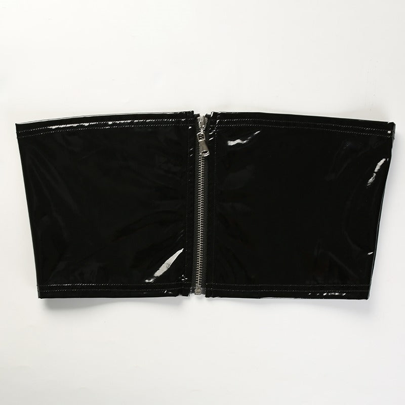 Stylish women's black zipper front crop top made of stretchy synthetic leather for chic aesthetic looks.