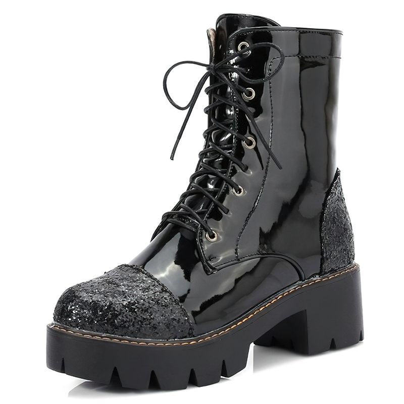 Shiny black women's ankle boots with thick heels and lace-up design, featuring stylish bright inserts for a trendy look.