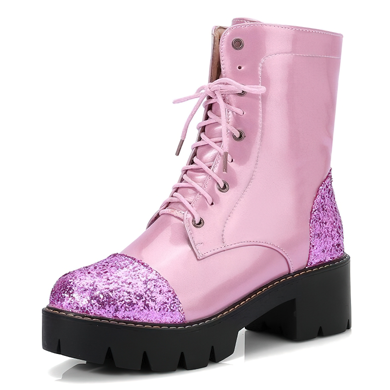 Trendy women's pink ankle boots with glitter accents and thick tractor heels for a stylish casual look.