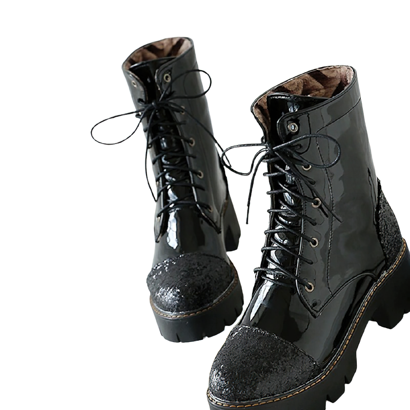 Stylish black ankle boots with thick heels and lace-up design, made from PU leather for casual fashion.