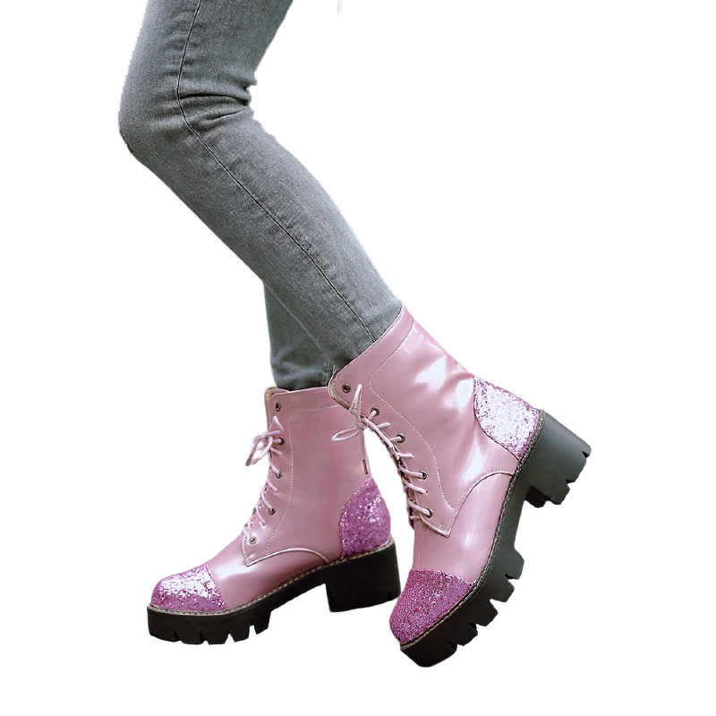 Stylish women's pink ankle boots with glitter accents and thick heels, perfect for casual fashion looks.