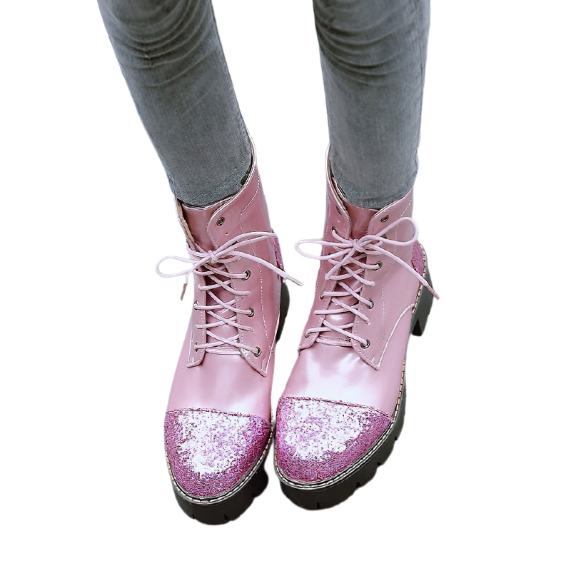 Stylish women's pink ankle boots with glittery toe caps, perfect for casual fashion and adding flair to any outfit.