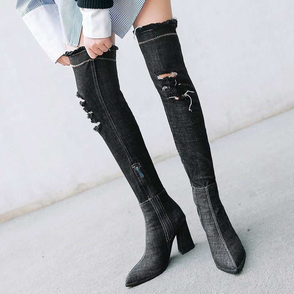 Over-the-knee women denim boots with pointed toe, stylish high heel, and distressed details for a chic casual look.
