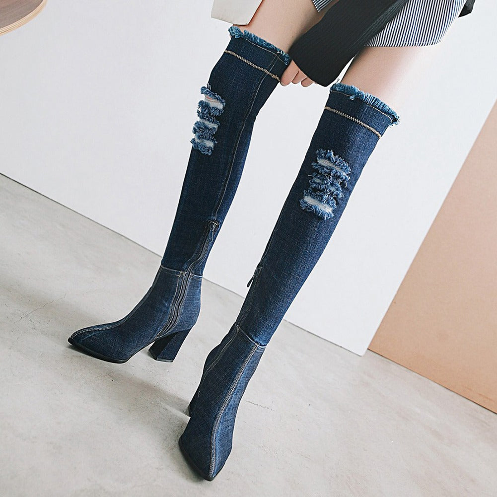 Stylish women's over-the-knee denim boots featuring a pointed toe and trendy distressed design.