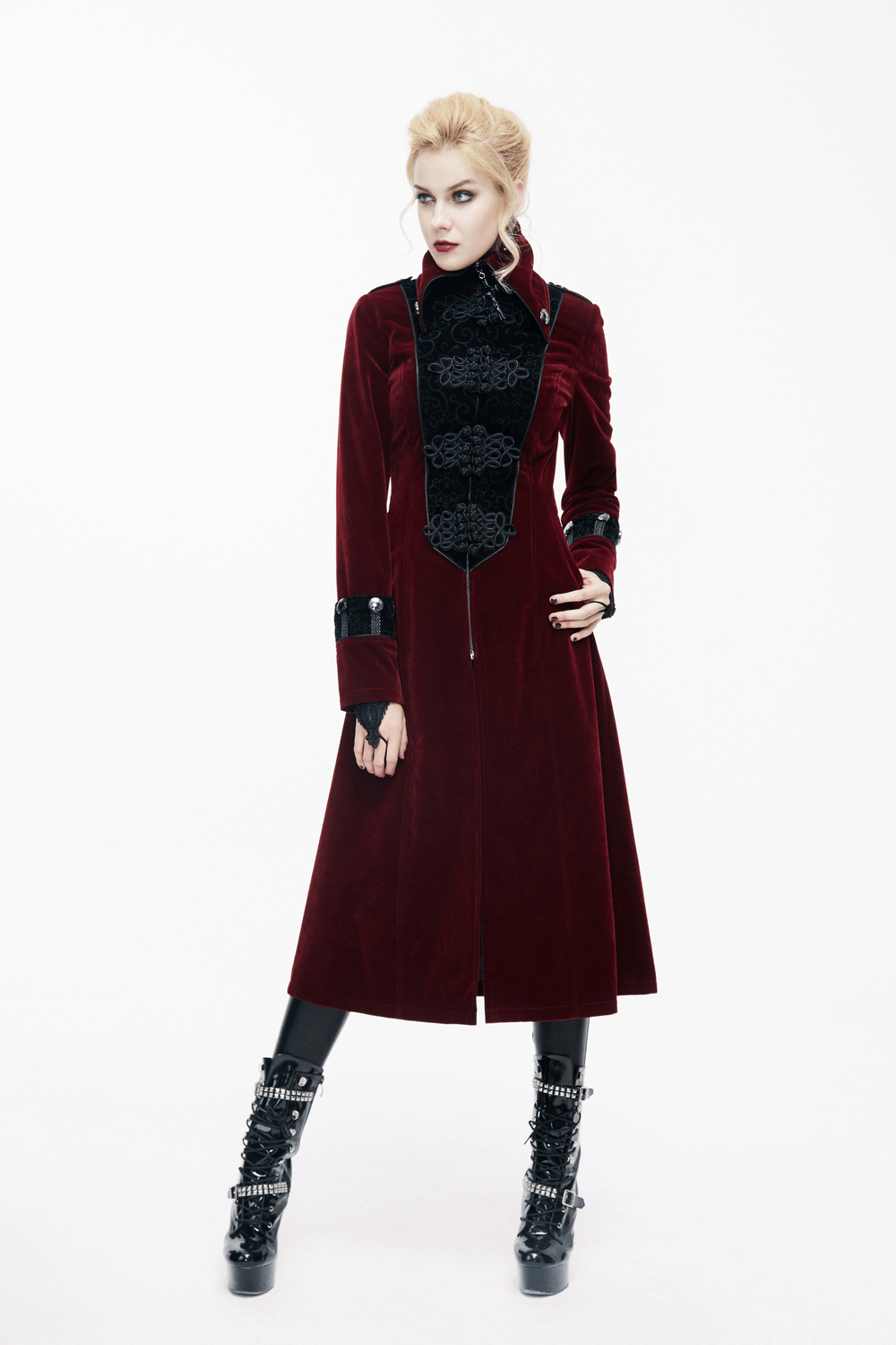 Gothic vintage women's red coat with high collar and lace details, paired with edgy black accessories.