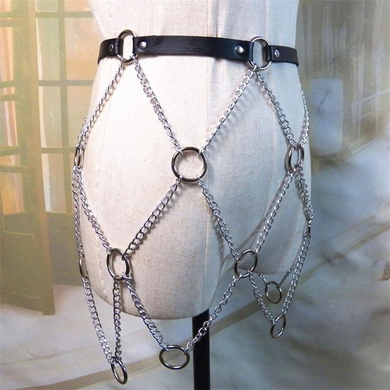 Women faux leather body harness with chains, showcasing rock star fashion style, perfect for skirts or pants.