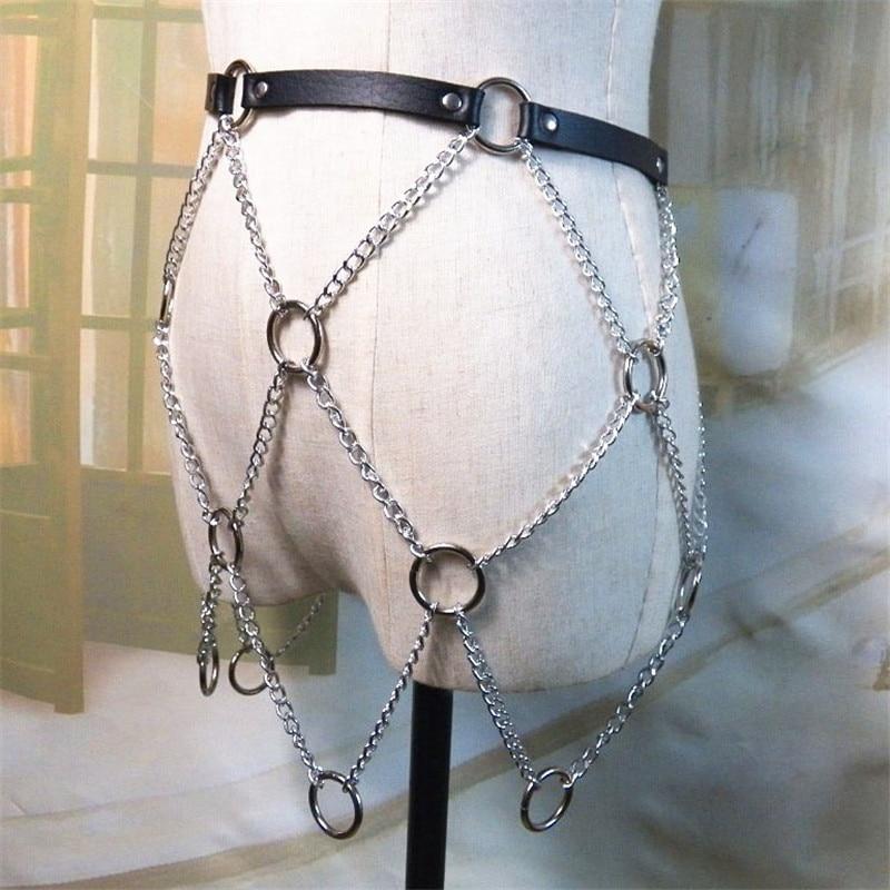 Women faux leather body harness with chains in a rock star style, perfect for skirts or pants.