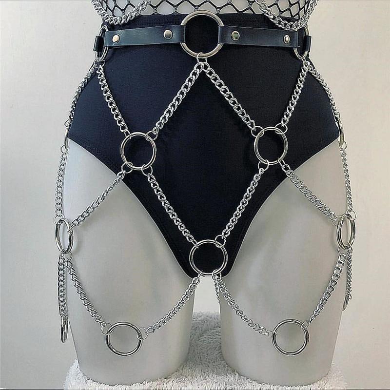Women’s faux leather body harness featuring silver link chains. Perfect for rock star fashion with a stylish silhouette.