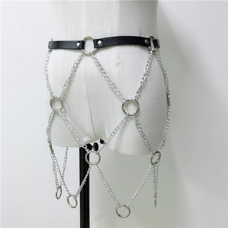 Women faux leather body harness with chains in rock star style, perfect for skirts or pants. A unique fashion statement.