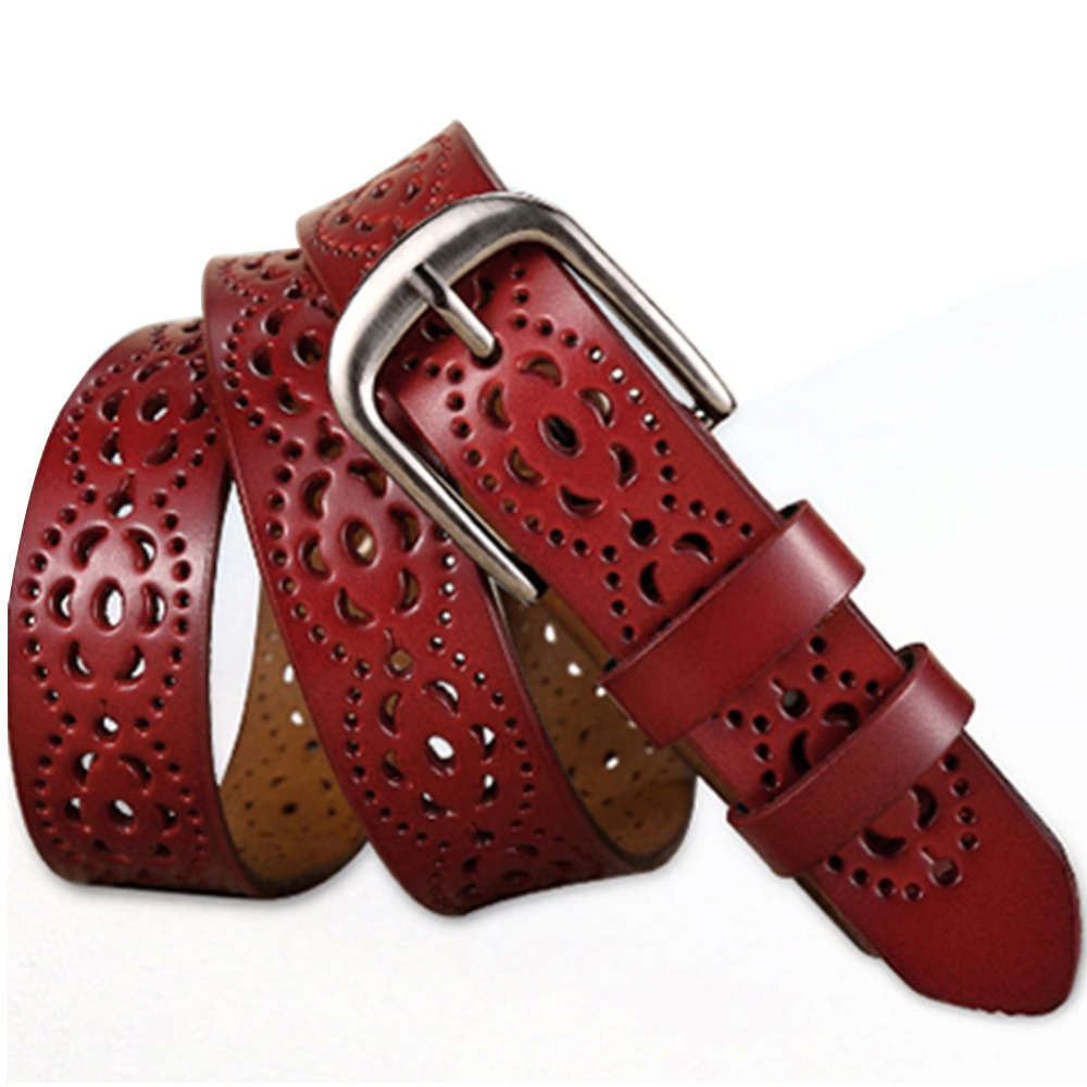 Women’s genuine leather floral carved belt in vintage red, perfect for chic outfits with floral prints.