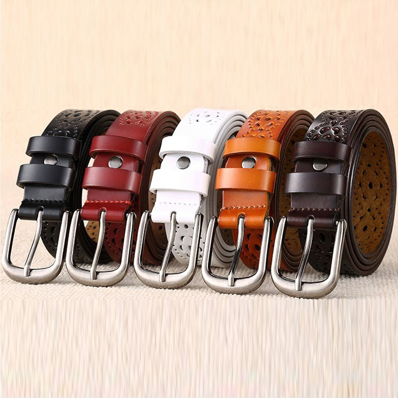 Collection of women's genuine leather floral carved belts in various colors: black, red, white, orange, and brown.