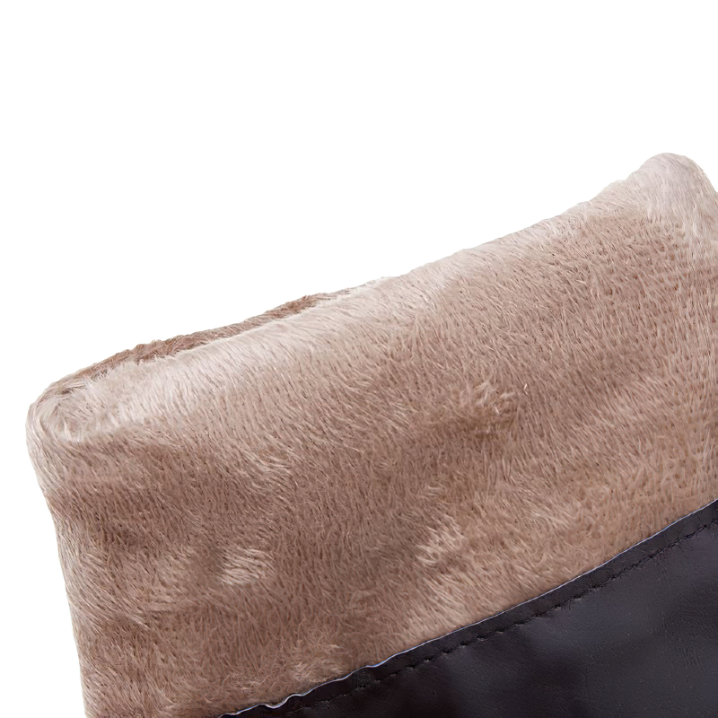 Close-up of the cozy faux fur lining on women’s knee boots in PU leather, highlighting comfort and style.
