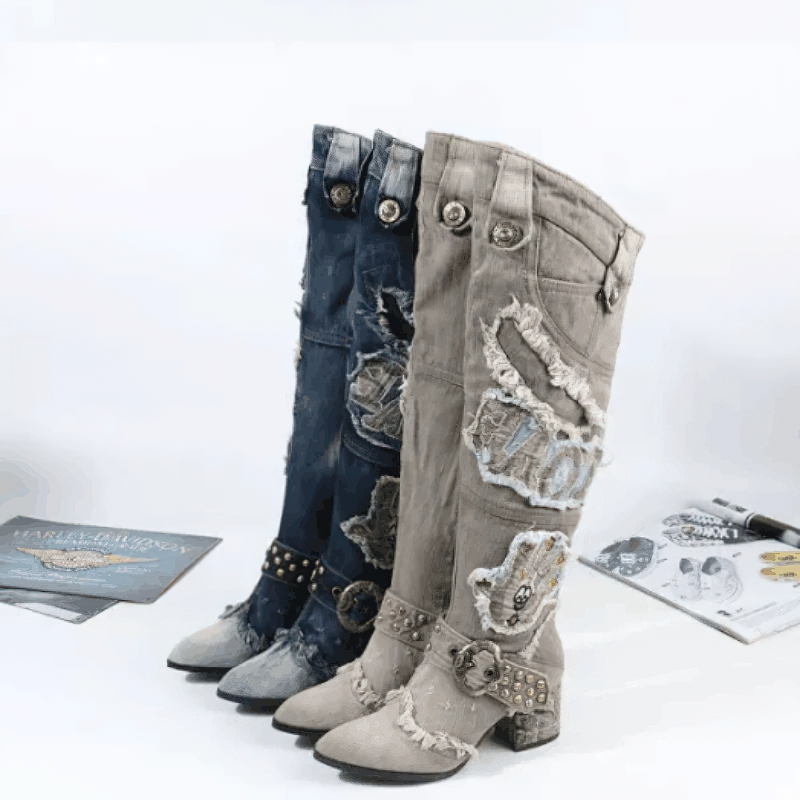 Stylish women knee-high boots with embroidery and rivet details in blue and beige denim.