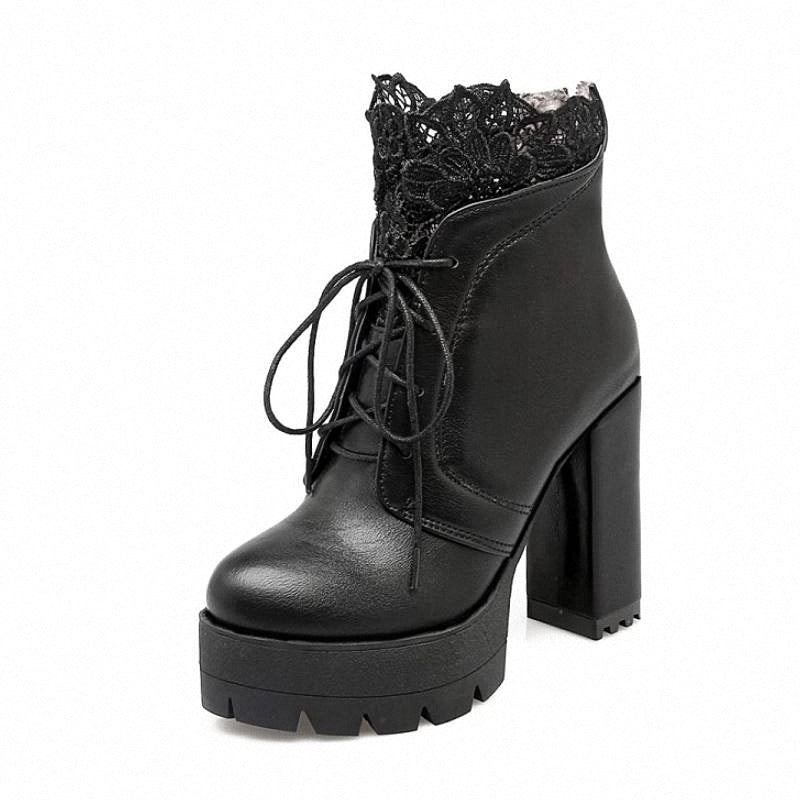 Women’s black Gothic platform boots with lace detail and high square heel, perfect for edgy outfits.